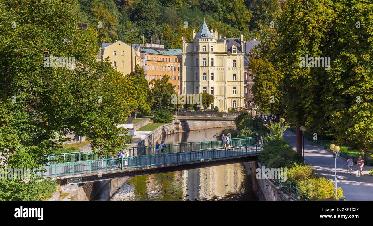 Bridge and historic buildings at the park in Karlovy Vary, Czech Republic Stock Photo