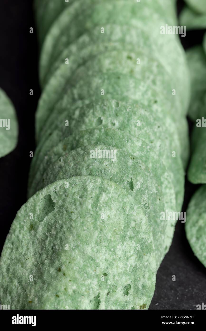 Thin and delicious green potato chips, crispy green chips with pepper