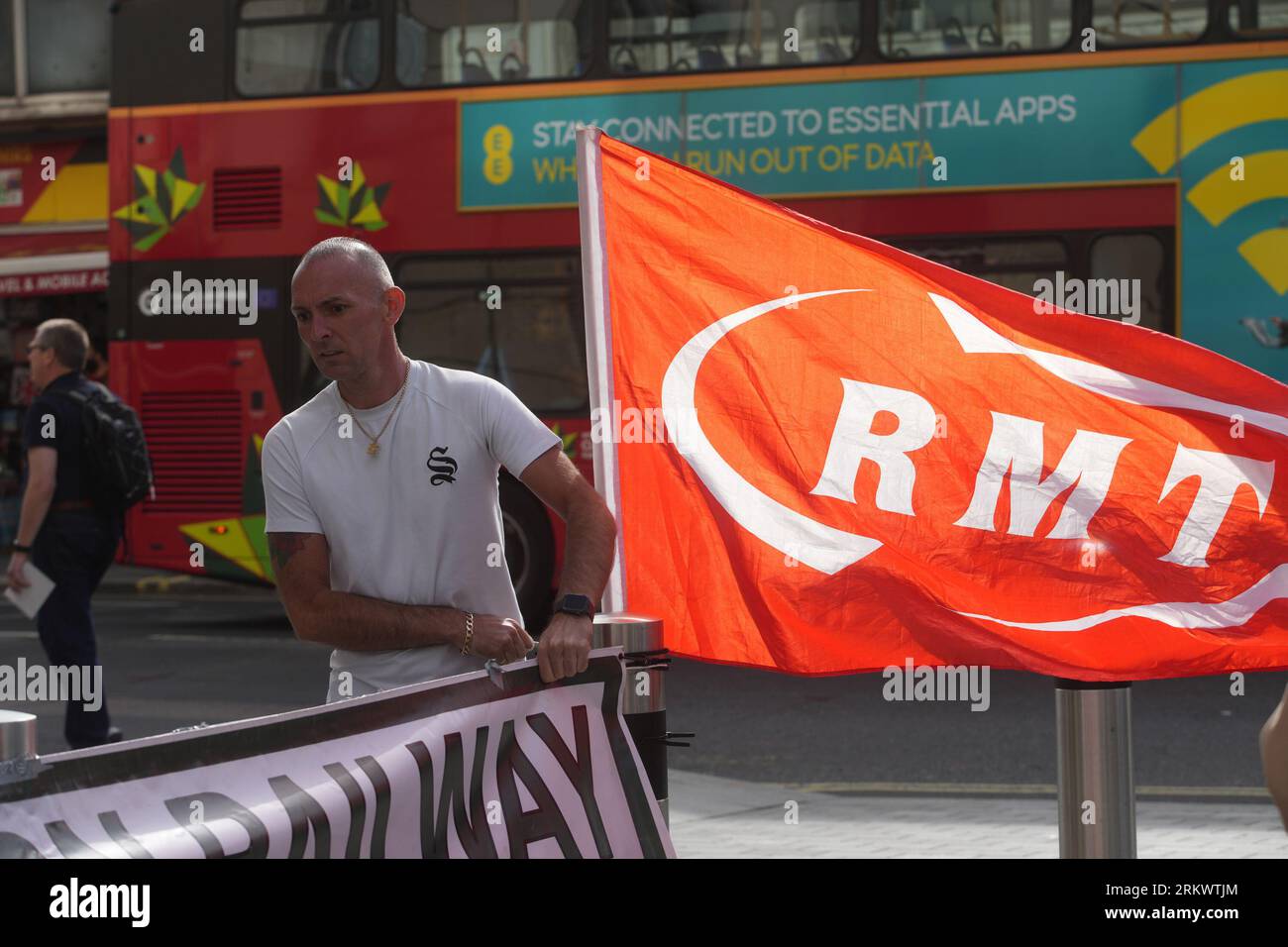 A RMT member on the picket line outside Paddington Station, London