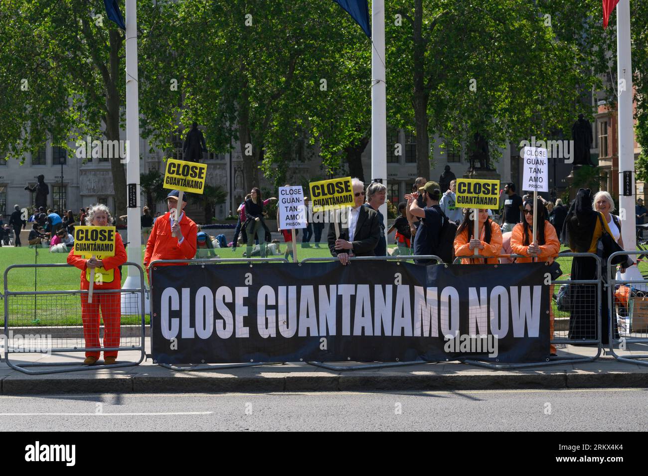 A close Guantanamo demonstration outside the Houses of Parliament, Parliament Square, London, UK.  7 Jun 2023 Stock Photo