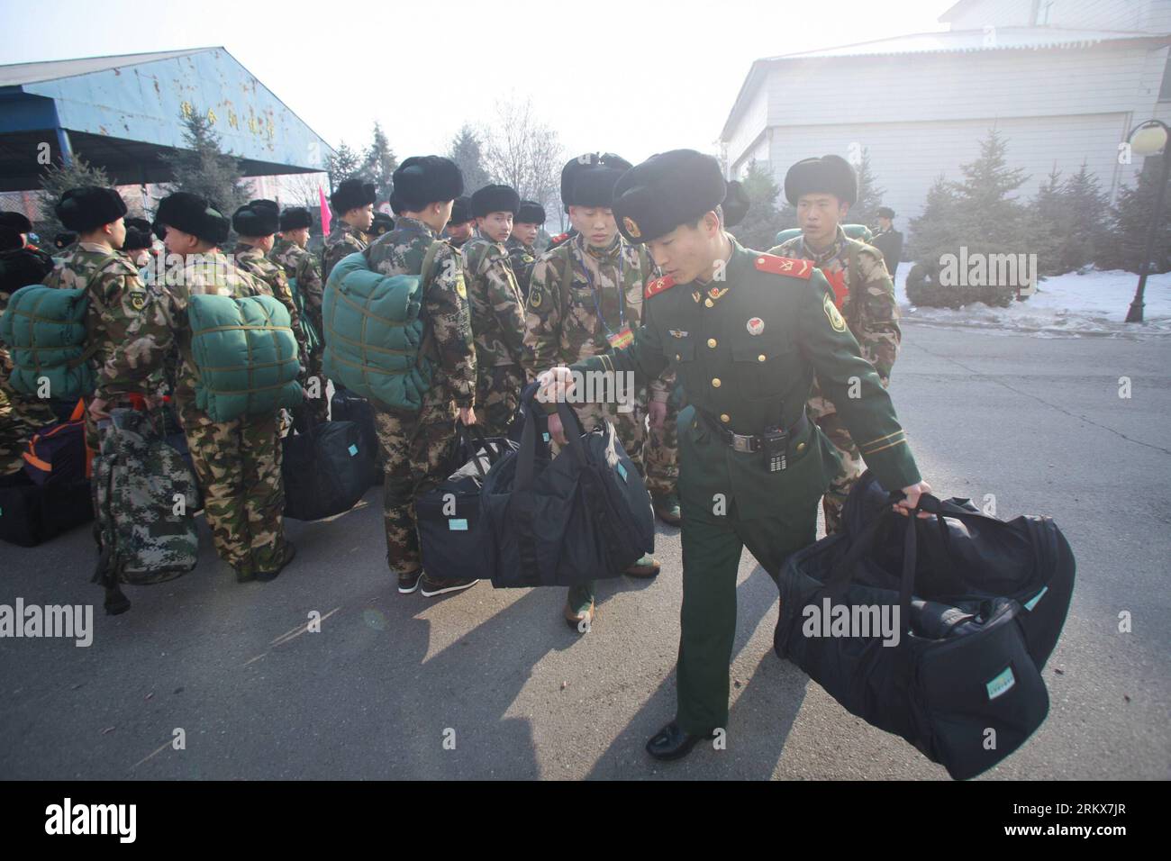 Bildnummer: 58910612  Datum: 12.12.2012  Copyright: imago/Xinhua (121212) -- HOHHOT, Dec. 12, 2012 (Xinhua) -- A veteran (Front) leads newly recruited para-military policemen to barracks in Hohhot, north China s Inner Mongolia Autonomous Region, Dec. 12, 2012. Newly recruited soldiers of People s Liberation Army (PLA) and para-military policemen joined their units around the country recently. (Xinhua/Zhang Fan) (zn) CHINA-HOHHOT-MILITARY-NEW RECUITS (CN) PUBLICATIONxNOTxINxCHN Gesellschaft Militär Rekruten Einberufung x0x xac 2012 quer      58910612 Date 12 12 2012 Copyright Imago XINHUA  Hohh Stock Photo