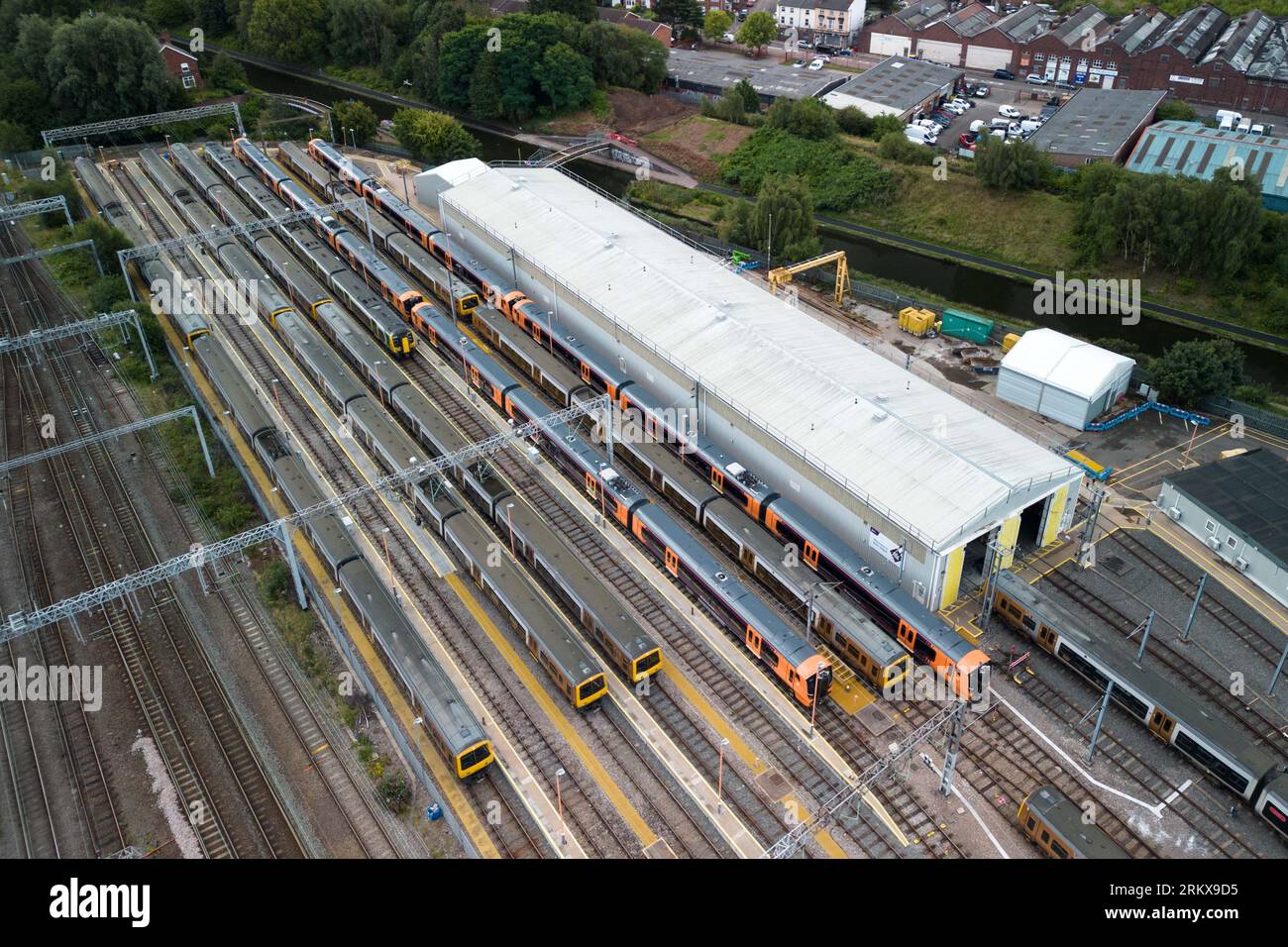 Winson Green, Birmingham, England, August 26th 2023. Parked up and unused West Midlands Railway trains at the Soho train maintenance depot in Birmingham during continued strike action. The industrial action, which is taking place across the country with services including West Midlands Trains, has been timed to coincide with the August Bank Holiday weekend. Pic Credit: Stop Press Media/Alamy Live News Stock Photo