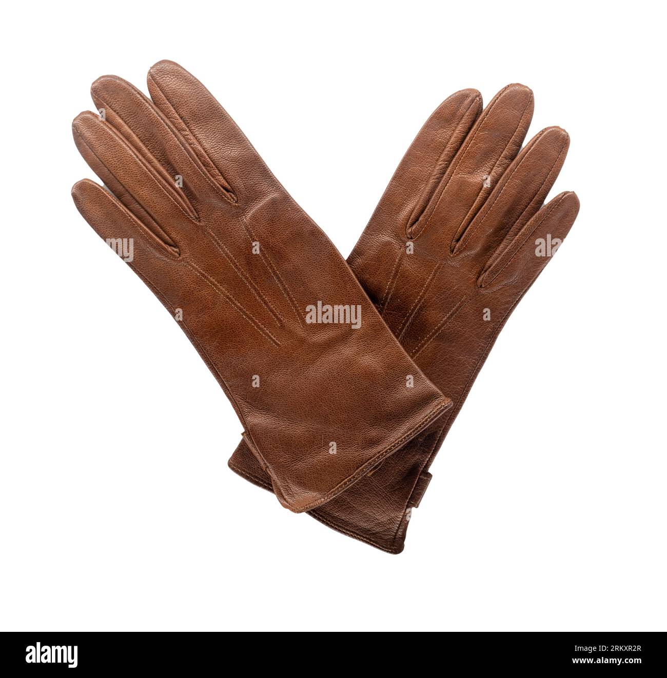 Pair of leather gloves isolated on white background. Brown accessory
