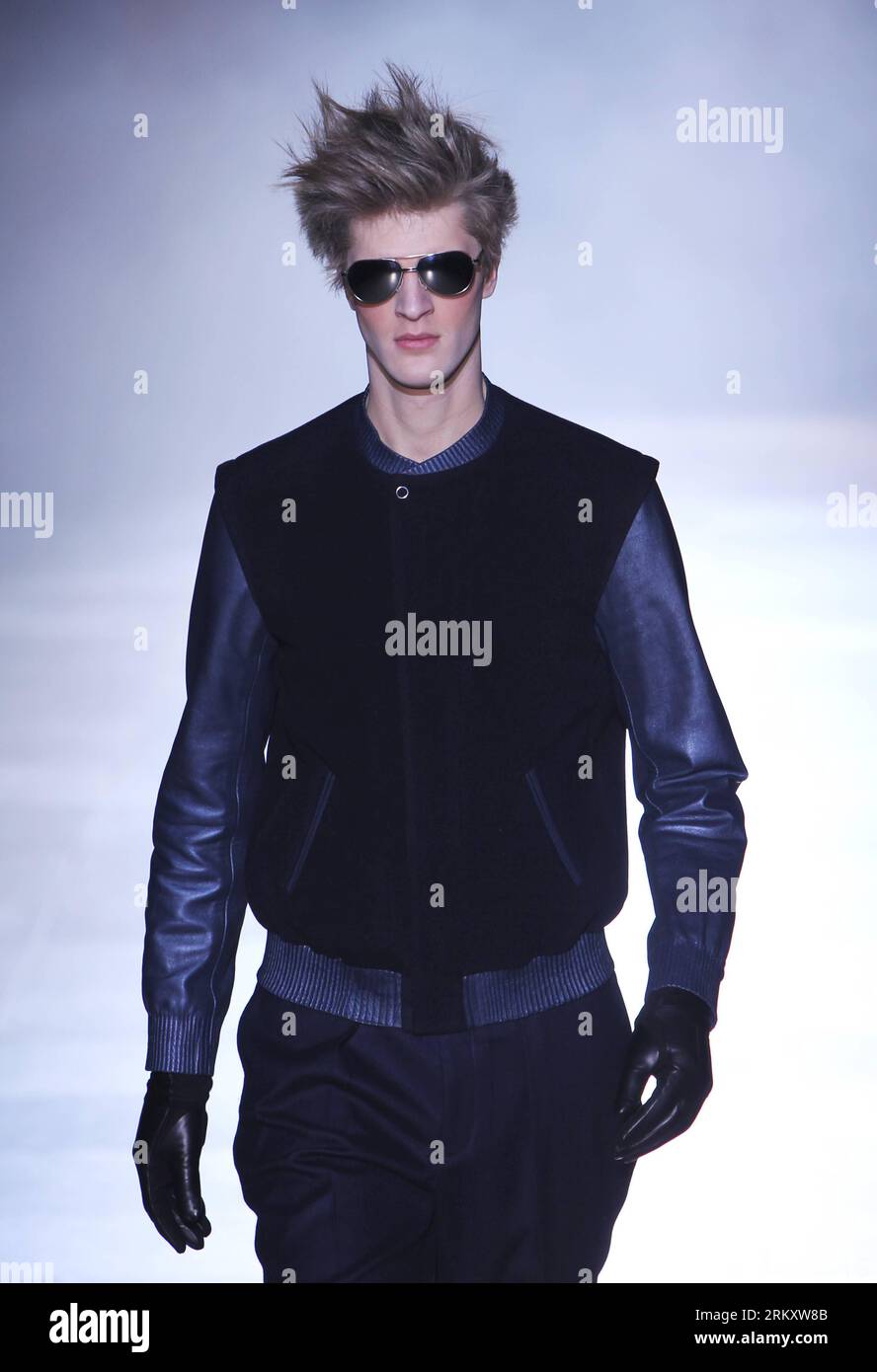 A model displays creations by Japanese designer Masahiko Saito at 2009  Spring/Summer Tokyo collection during the Japan Fashion Week in Tokyo  Thursday, Sept. 4, 2008. It was the first entry to the, image size:888x1390