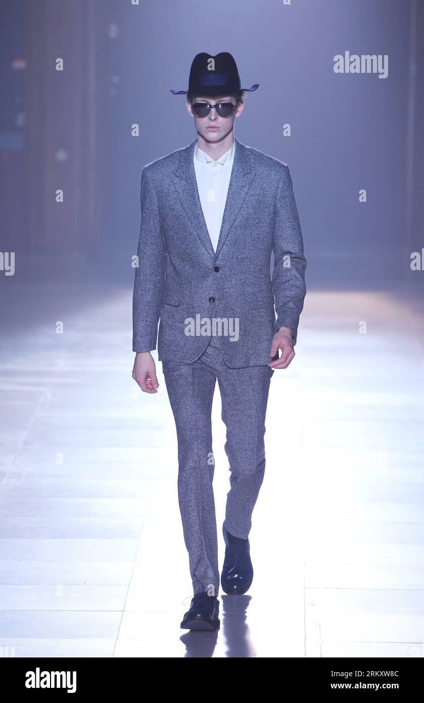 A model displays creations by Japanese designer Cabaret Aki and Jackal Kuzu  at the GUT'S DYNAMITE CABARETS 2009 Spring/Summer Tokyo collection during  the Japan Fashion Week in Tokyo Thursday, Sept. 4, 2008., image size:839x1390