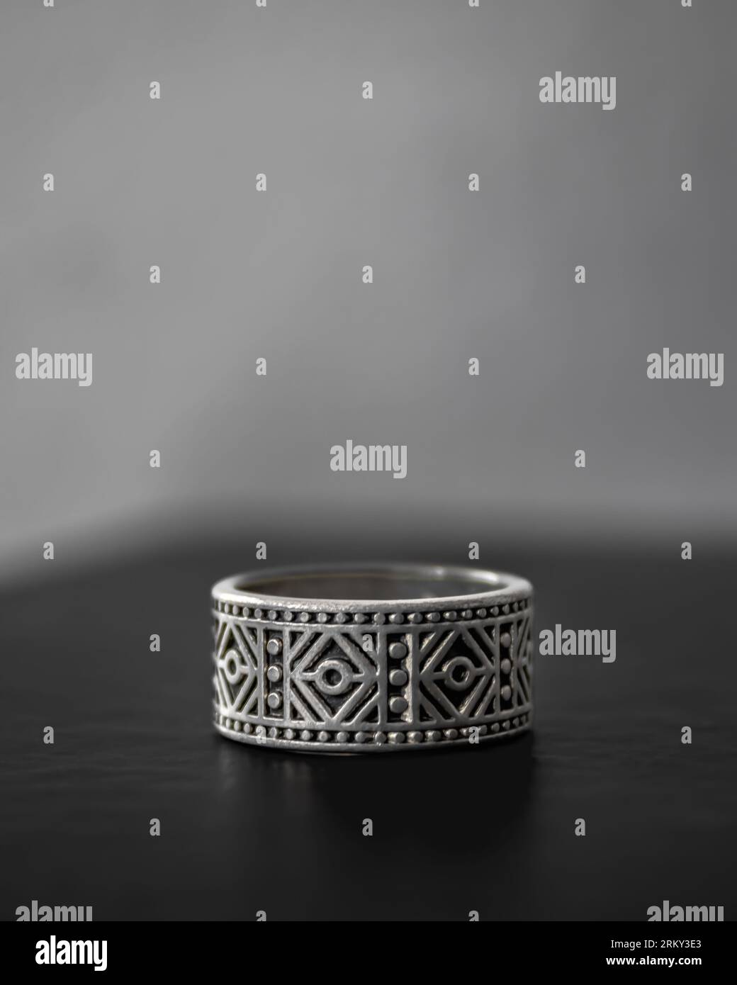 Product photo of a Viking themed silver ring Stock Photo