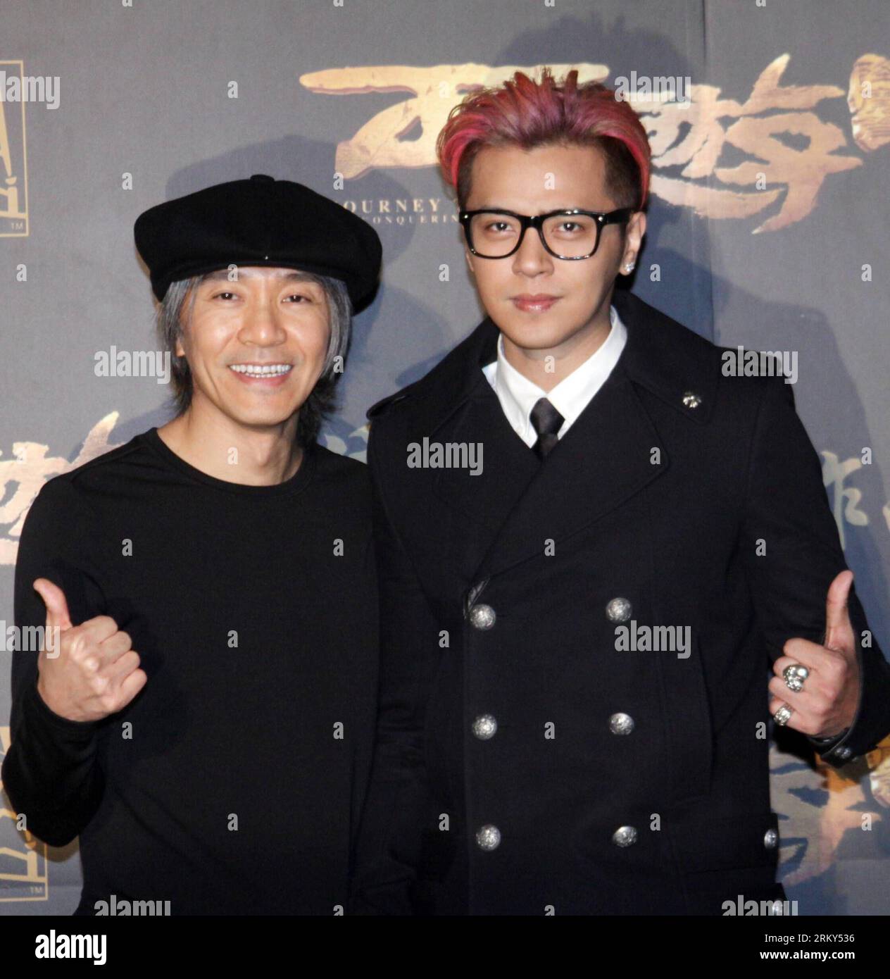 Bildnummer: 59146050  Datum: 28.01.2013  Copyright: imago/Xinhua (130128) -- TAIPEI, Jan. 28, 2013 (Xinhua) -- Director Stephen Chow (L) and actor Show Lo pose for photo during a press conference of the movie Journey to the West: Conquering the Demons in Taipei, southeast China s Taiwan, Jan. 28, 2013. The movie is expected to hit the screen on Feb. 7, 2013 in Taipei. (Xinhua) (mp) CHINA-TAIPEI-MOVIE-PRESS CONFERENCE (CN) PUBLICATIONxNOTxINxCHN Entertainment Kultur People PK Film Premiere Filmpremiere Die Reise nach Westen x0x xdd 2013 quadrat premiumd      59146050 Date 28 01 2013 Copyright I Stock Photo