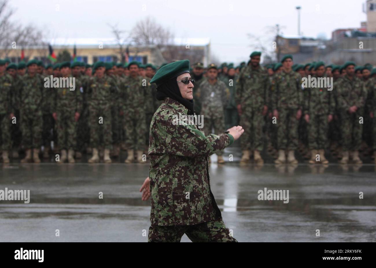 Bildnummer: 59155819  Datum: 31.01.2013  Copyright: imago/Xinhua (130131) -- KABUL, Jan. 31, 2013 (Xinhua) -- An Afghan woman officer marches during a graduation ceremony at the Kabul Military Training Center in Kabul, Afghanistan, on Jan. 31, 2013. A total of 1,400 soldiers graduated from Kabul Military Training Center (KMTC) on Thursday and were commissioned to Afghan National Army (ANA), General Aminullah Patyannai commander of KMTC said. (Xinhua/Ahmad Massoud) AFGHANISTAN-KABUL-SOLDIERS-GRADUATION PUBLICATIONxNOTxINxCHN Gesellschaft Militär Armee Soldat Ausbildung Militärausbildung Abschlu Stock Photo