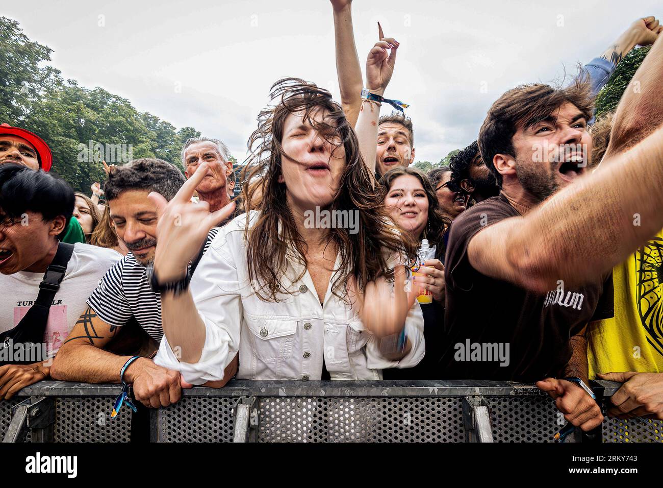Paris, France. 25th Aug, 2023. People attend the Rock en Seine Music festival in Paris. The second day of 20th edition of the French music festival Rock en Seine has been headlined by the British Placebo, at Domaine National de Saint-Cloud. (Photo by Telmo Pinto/SOPA Images/Sipa USA) Credit: Sipa USA/Alamy Live News Stock Photo