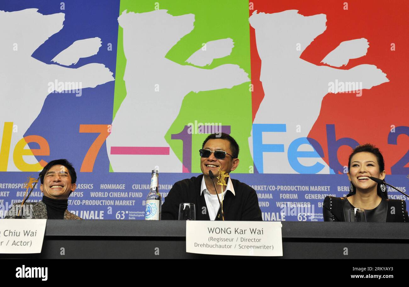 Bildnummer: 59190332  Datum: 07.02.2013  Copyright: imago/Xinhua (130208) -- BERLIN, Feb. 7, 2013 (Xinhua) -- Director Wong Kar Wai(C), actor Tony Leung (L) and actress Zhang Ziyi attend the press conference to promote the film The Grandmaster at the 63rd Berlinale film festival in Berlin, Germany, Feb. 7, 2013. The 63rd Berlinale film festival opens Thursday with a martial arts epic The grandmaster of Chinese director Wong Kar Wai who will also lead the jury of this Berlinale. (Xinhua/Ma Ning) (dzl) GERMANY-BERLIN-FILM FESTIVAL-THE GRANDMASTER PUBLICATIONxNOTxINxCHN Kultur Entertainment Peopl Stock Photo