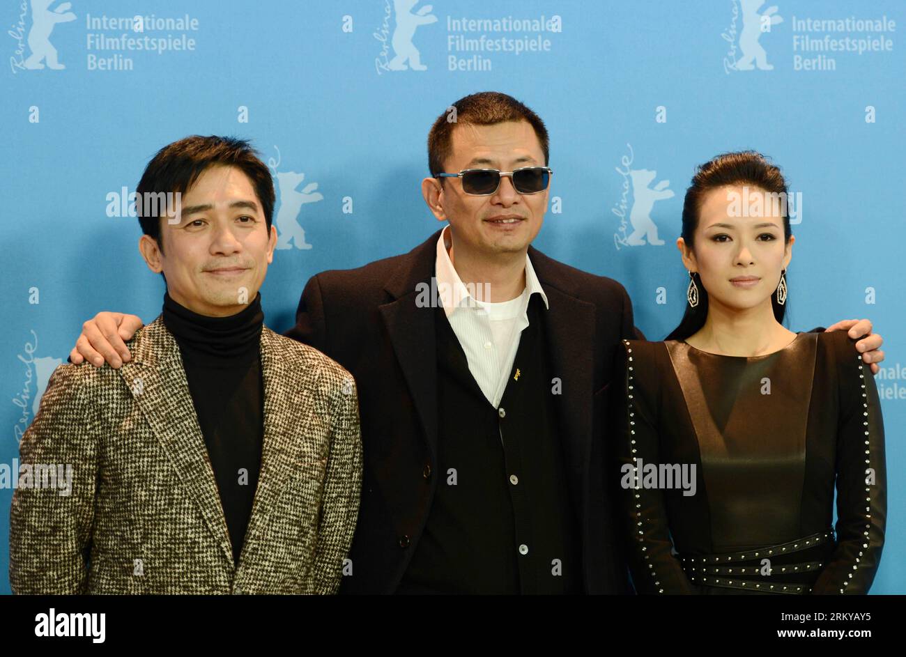 Bildnummer: 59190329  Datum: 07.02.2013  Copyright: imago/Xinhua (130208) -- BERLIN, Feb. 7, 2013 (Xinhua) -- Director Wong Kar Wai(C), actor Tony Leung (L) and actress Zhang Ziyi attend the photocall to promote the film The Grandmaster at the 63rd Berlinale film festival in Berlin, Germany, Feb. 7, 2013. The 63rd Berlinale film festival opens Thursday with a martial arts epic The grandmaster of Chinese director Wong Kar Wai who will also lead the jury of this Berlinale. (Xinhua/Ma Ning) (dzl) GERMANY-BERLIN-FILM FESTIVAL-THE GRANDMASTER PUBLICATIONxNOTxINxCHN Kultur Entertainment People Film Stock Photo