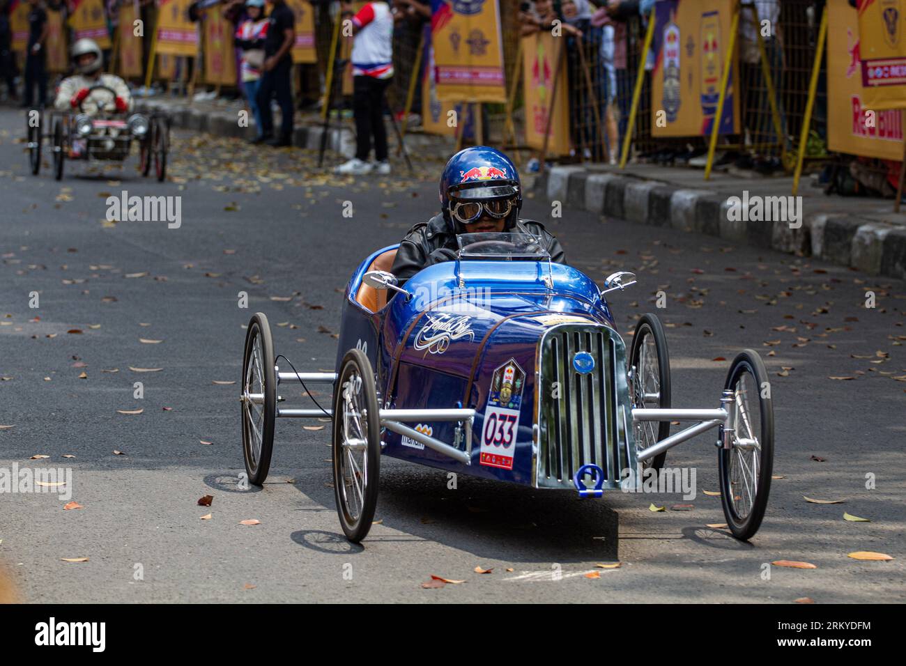 Bandung, West Java, Indonesia. 26th Aug, 2023. Soapbox cart riders race downhill during the race at the downtown in Bandung. A total of 125 participants took part in the competition, which was organized to enhance creativity and entertainment for the people after a thirty-five year hiatus. (Credit Image: © Algi Febri Sugita/ZUMA Press Wire) EDITORIAL USAGE ONLY! Not for Commercial USAGE! Stock Photo