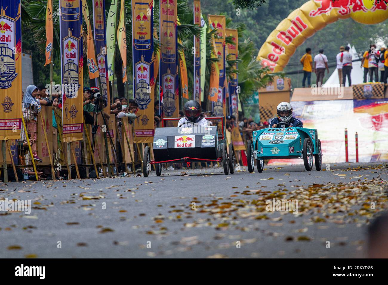 Bandung, West Java, Indonesia. 26th Aug, 2023. Soapbox cart riders race downhill during the race at the downtown in Bandung. A total of 125 participants took part in the competition, which was organized to enhance creativity and entertainment for the people after a thirty-five year hiatus. (Credit Image: © Algi Febri Sugita/ZUMA Press Wire) EDITORIAL USAGE ONLY! Not for Commercial USAGE! Stock Photo