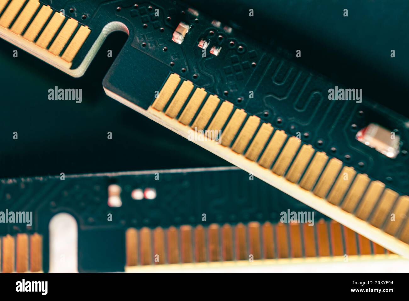 DDR4 DRAM memory module golden electrical contact components macro. Computer RAM chip close-up. Desktop PC memory parts for assemble Stock Photo