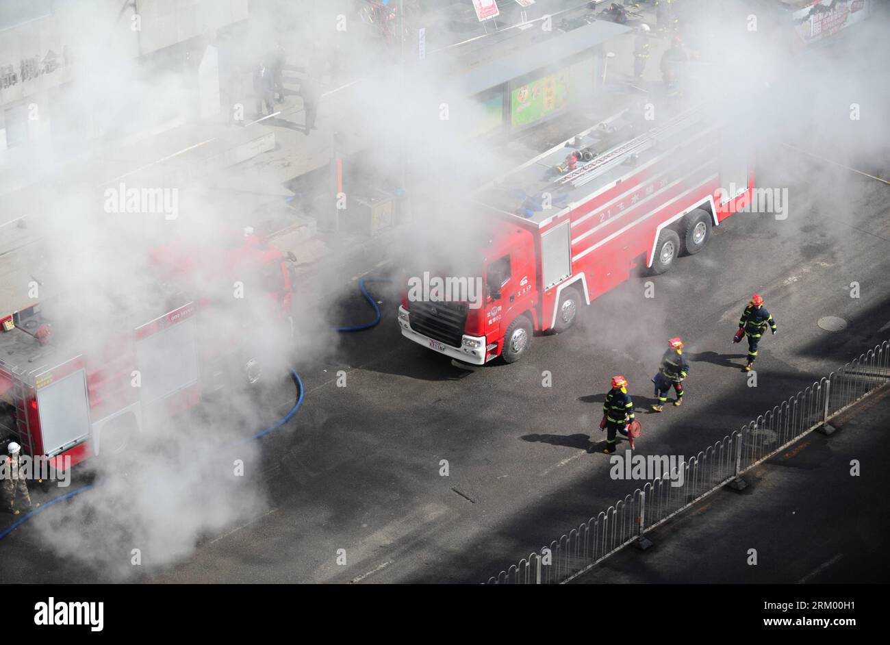 Bildnummer: 59296502  Datum: 04.03.2013  Copyright: imago/Xinhua (130304) -- SHENYANG, March 4, 2013 (Xinhua) -- Firefighters work at the accident site after a gas explosion occurred in an underground shopping street in Shenyang, capital of northeast China s Liaoning Province, March 4, 2013. More than 20 workers were injured in the explosion triggered by a gas leak from underground pipelines at a construction site in the underground shopping street in front of a shopping mall on Monday morning. Some 40 workers were at the scene at the time of the explosion. (Xinhua/Pan Yulong) (ry) CHINA-LIAON Stock Photo