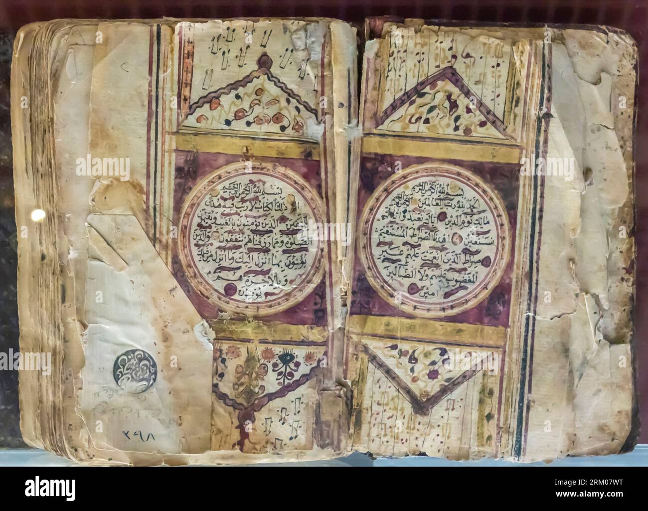 Holy Quran showing signs of wear. 18th century Stock Photo Alamy