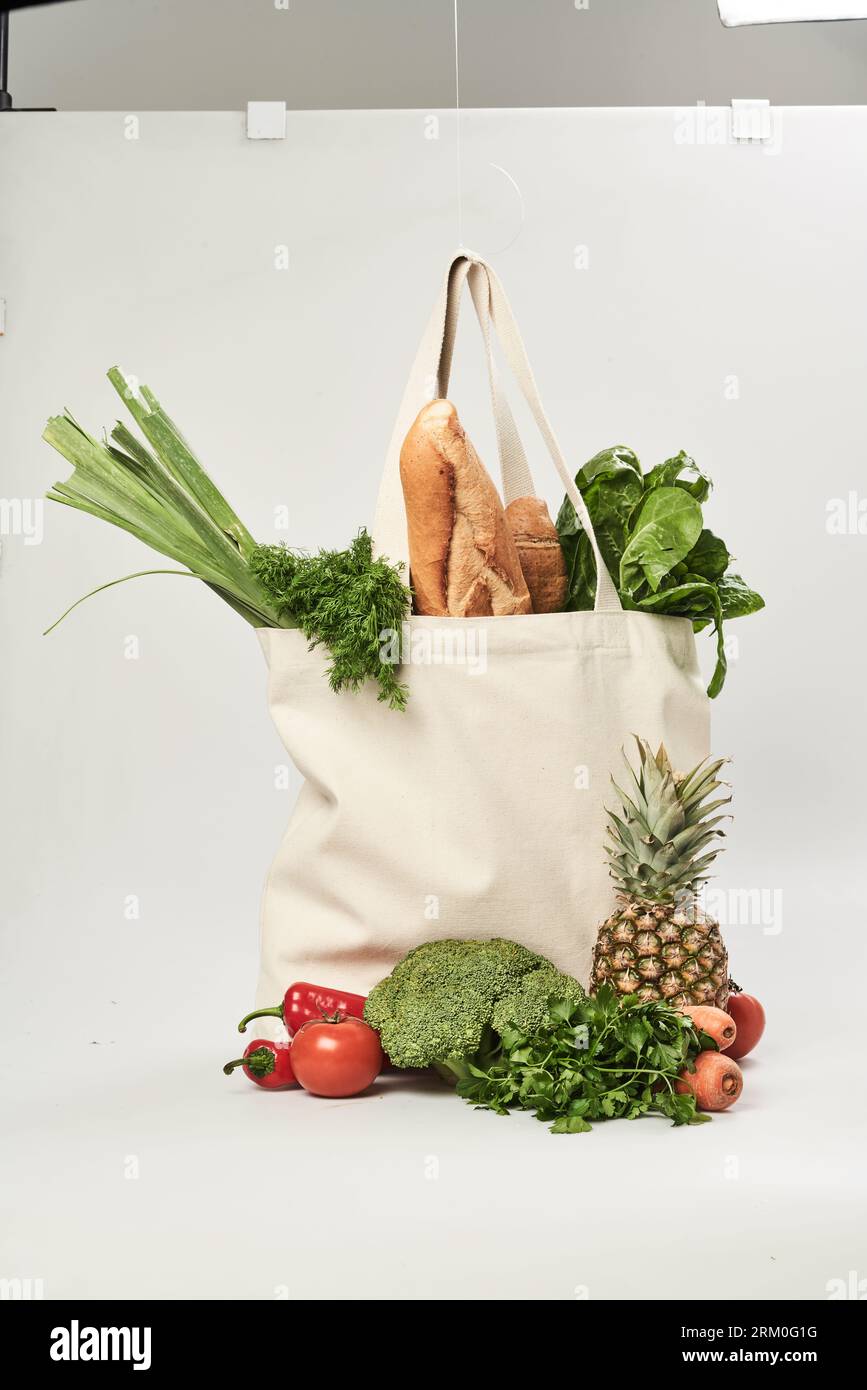 beautiful isolated picture of a multiple use cotton grocery bag. eco