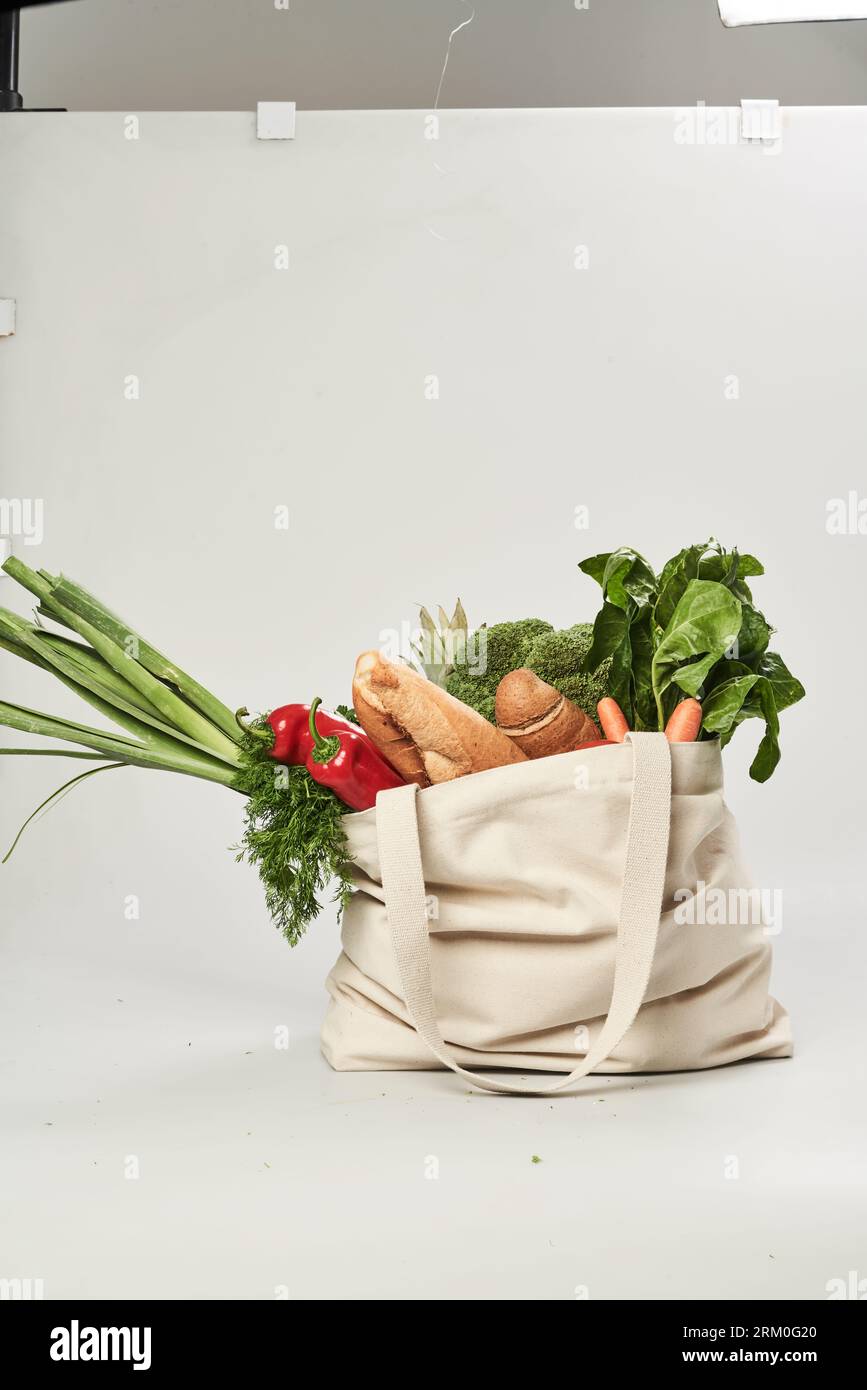 beautiful isolated picture of a multiple use cotton grocery bag. eco