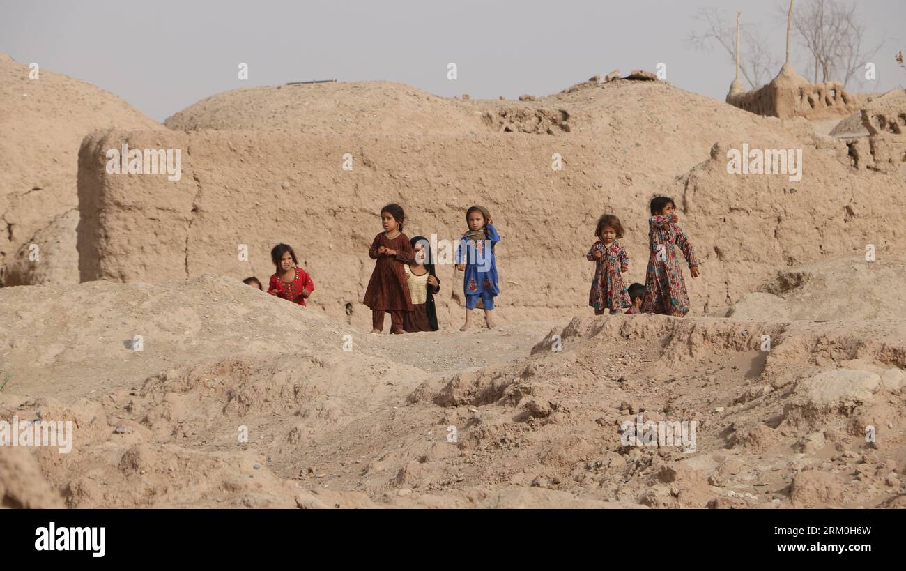 Farah, Afghanistan. 26th July, 2023. Children are pictured in a village threatened by unexploded ordnance left by U.S. forces in Farah Province, Afghanistan, July 26, 2023. TO GO WITH 'Feature: U.S.-left unexploded ordnance still claiming lives of Afghans' Credit: Marshal/Xinhua/Alamy Live News Stock Photo