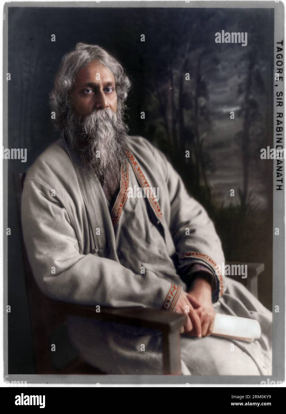 Rabindranath Tagore, three-quarter-length portrait, seated, facing right. Circa 1917. Unknown photographer. Stock Photo