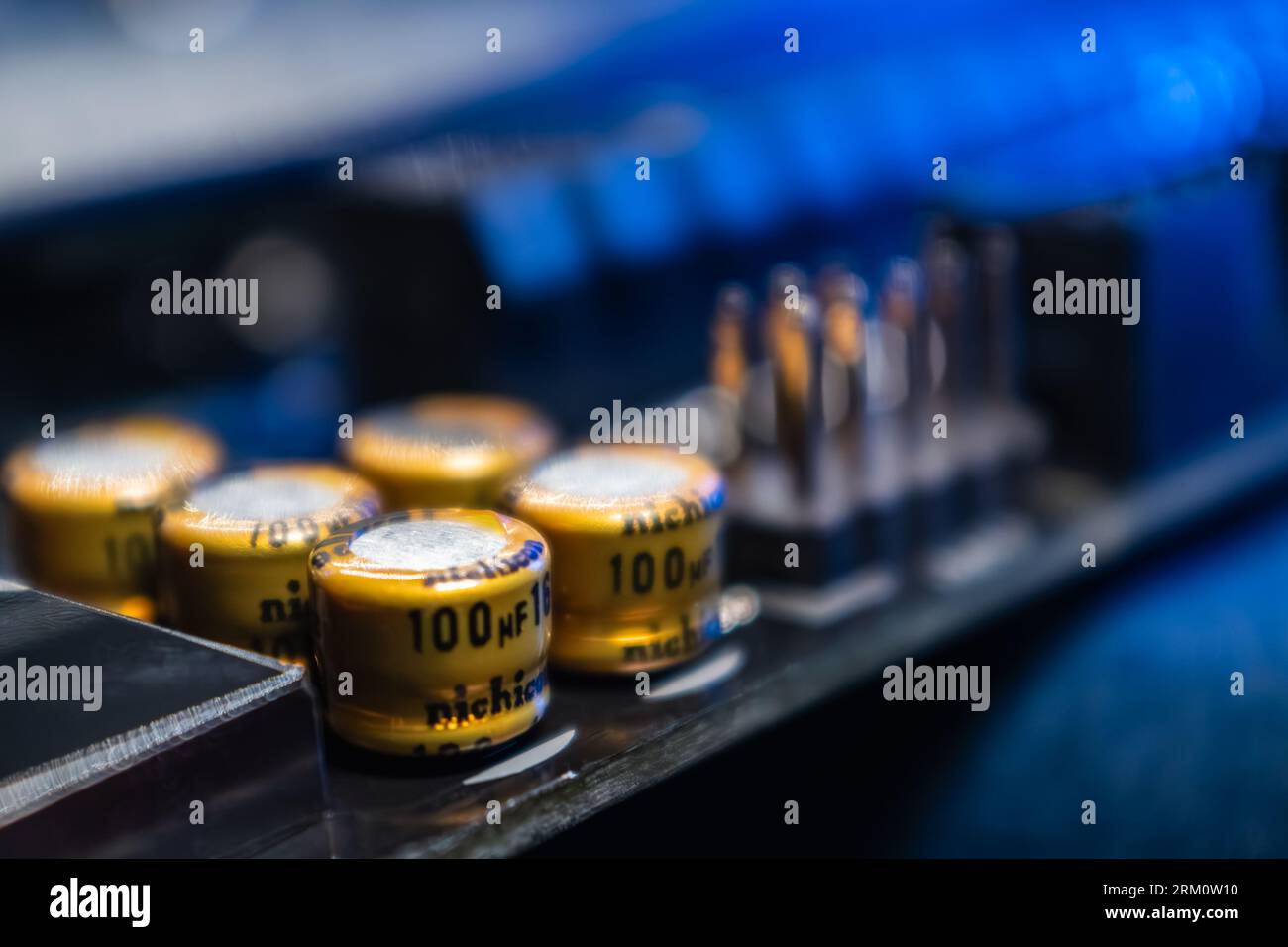 Kyiv, Ukraine - January 05, 2022: Socket pins and Nichicon resistors on motherboard close-up of modern powerful desktop PC. Computer hardware chipset Stock Photo
