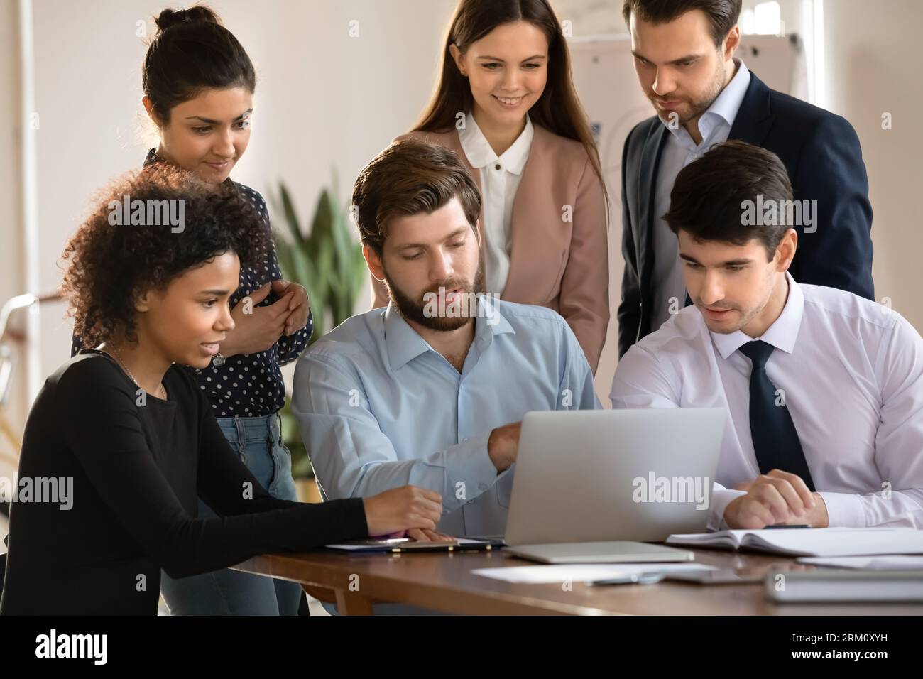 Young diverse colleagues work hi-res stock photography and images - Alamy
