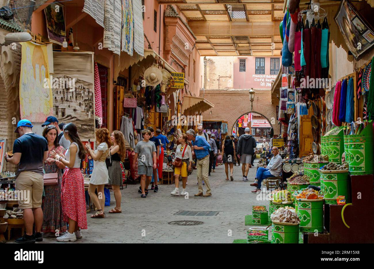 Marrakech, Morocco, April 8th, 2023. Tourists visiting Marrakech medina souks in a sunny day. Stock Photo