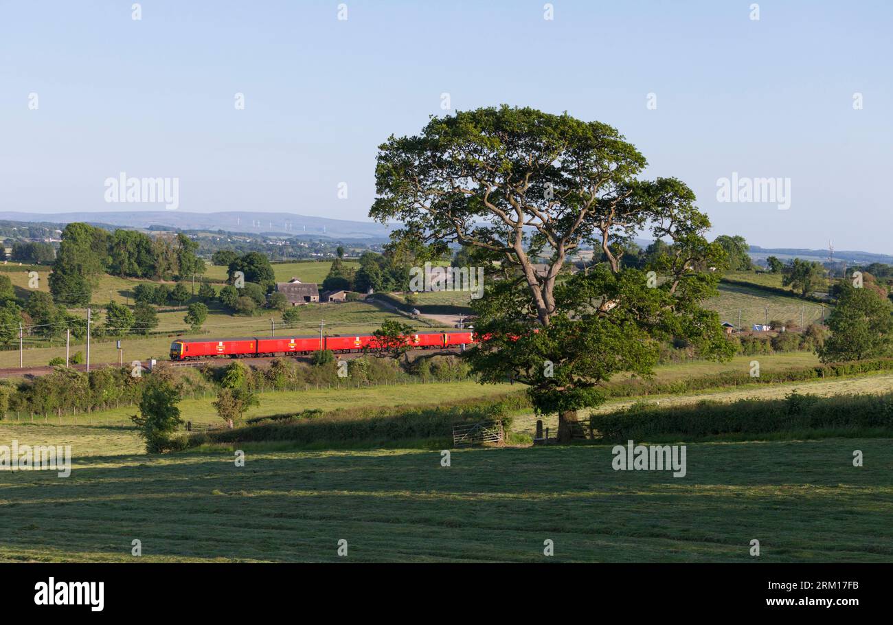 Royal Mail class 325 freight multiple units on the west coast mainline in Cumbria with Shieldmuir to Warrington working Stock Photo