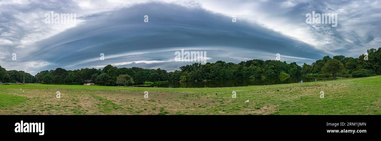 Panorama of a thunderstorm shelfcloud over a nature area Stock Photo