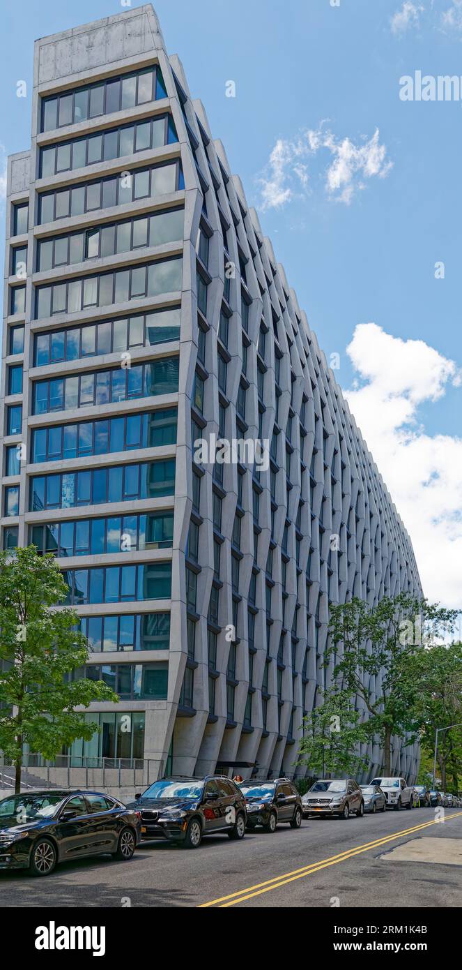 Morningside Heights: Enclave at the Cathedral is controversial for its stark form and for its proximity to landmark Cathedral of St. John the Divine. Stock Photo