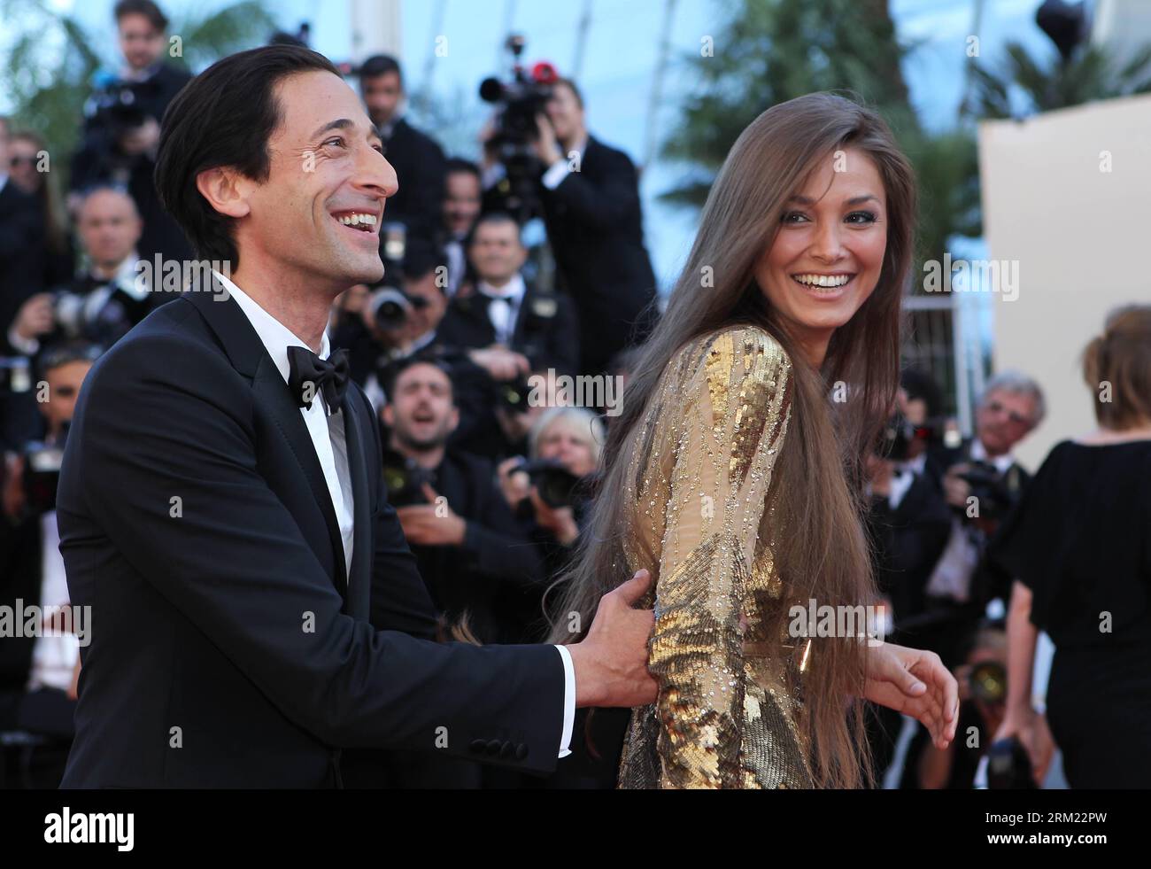 Bildnummer: 59675531  Datum: 21.05.2013  Copyright: imago/Xinhua CANNES, May 21, 2012 -- US actor Adrien Brody poses with his partner Lara Lieto as they arrive for the screening of the American film Behind the Candelabra presented in Competition at the 66th edition of the Cannes Film Festival in Cannes, southern France, May 21, 2013. (Xinhua/Gao Jing) (dzl) FRANCE-CANNES-FILM FESTIVAL-BEHIND THE CANDELABRA -PREMIERE PUBLICATIONxNOTxINxCHN Entertainment Film 66 Internationale Filmfestspiele Cannes People premiumd x0x xkg 2013 quer Aufmacher     59675531 Date 21 05 2013 Copyright Imago XINHUA Ca Stock Photo