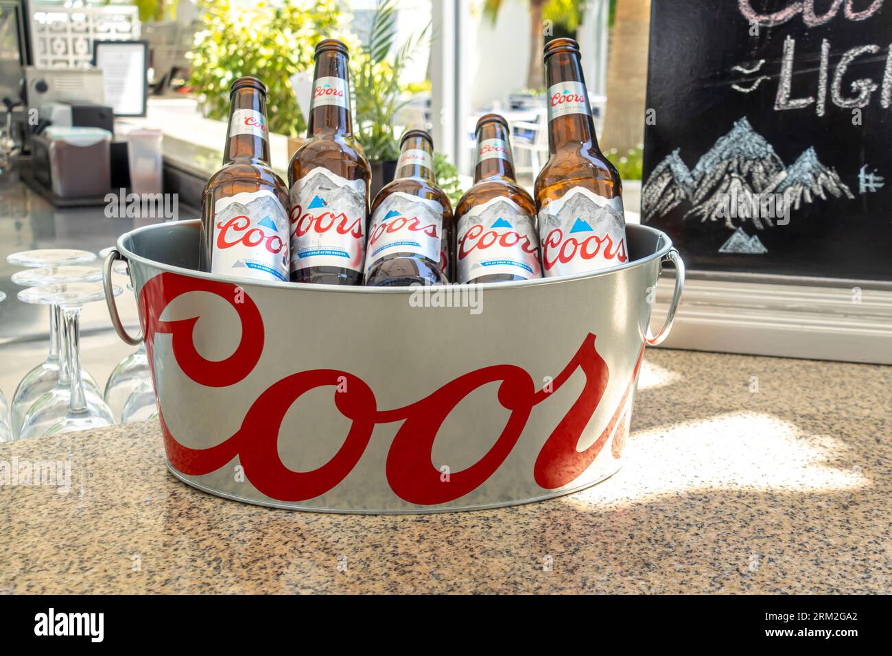 Coor beer bottles in a branded bucket cooler Stock Photo