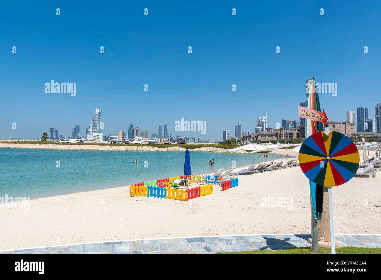 Family area at the beach in Bahrain Bay, Ritz Carlton hotel beach Stock Photo