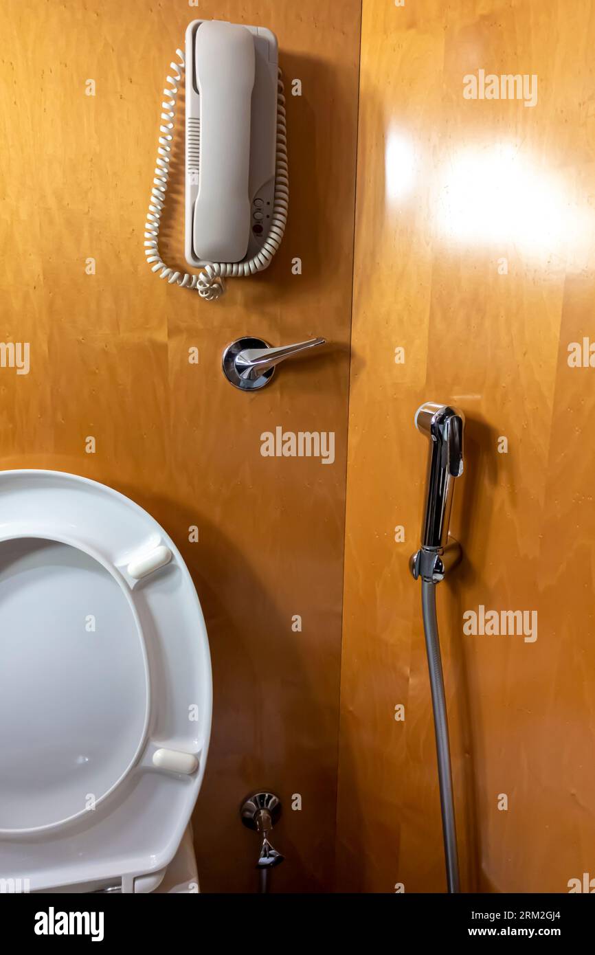 Emergency telephone set up in restroom. Stock Photo