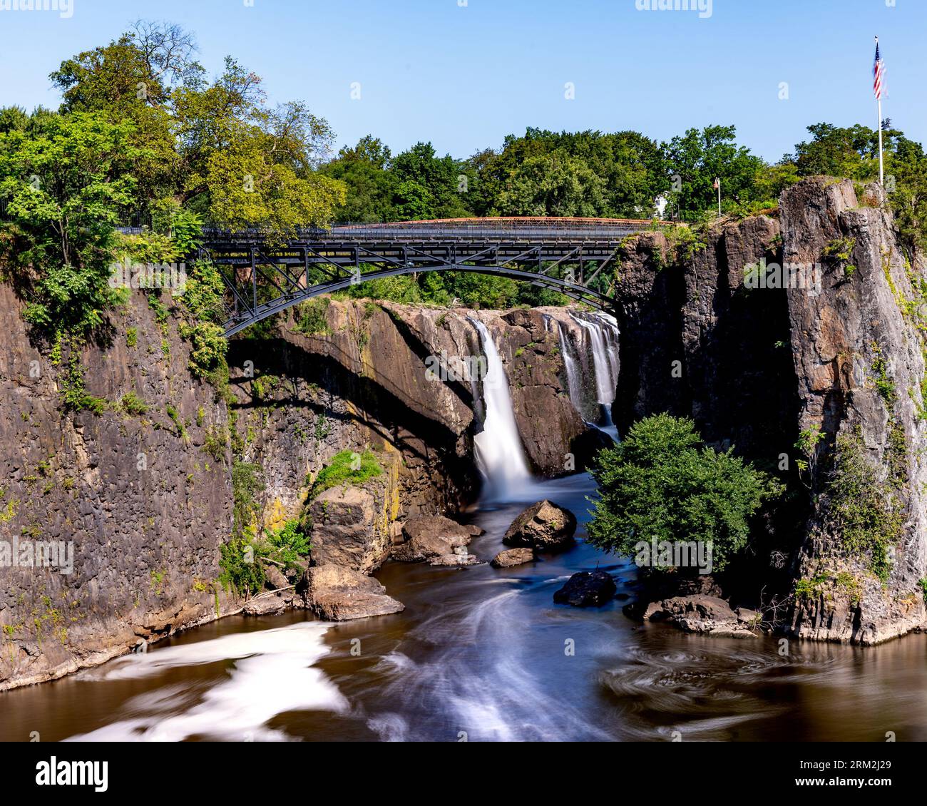 Paterson, NJ - US - Aug 20, 2023  Horizontal view of the falls at the historic Paterson Great Falls National Historical Park during the summer. Stock Photo