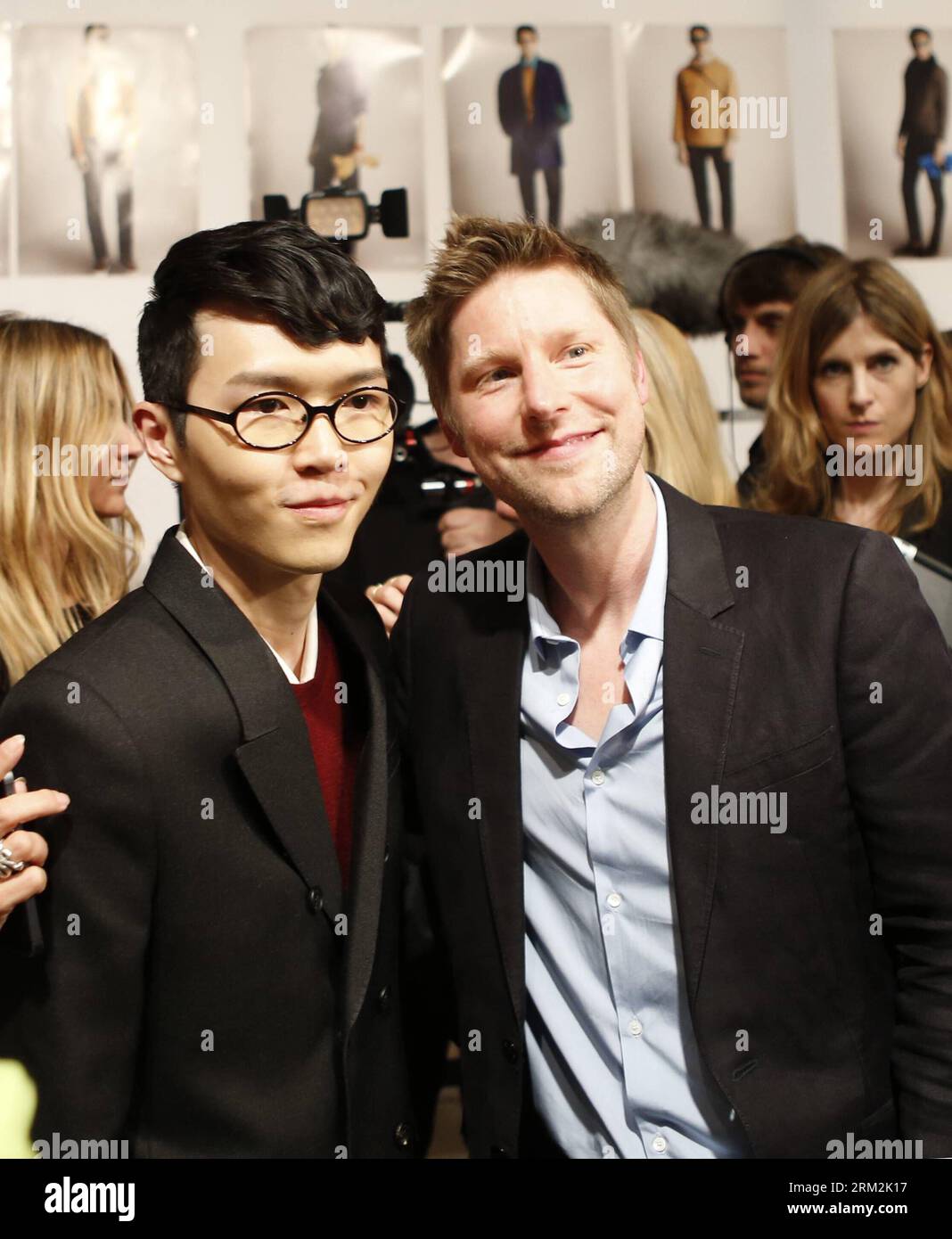 LONDON, June 18, 2013 - Khalil Fong (L), singer and songwriter from Chinese Hong Kong, and Burberry Chief Creative Officer Christopher Bailey pose backstage at Burberry Menswear Spring/Summer 2014 at Kensington Gardens in London, Britain on June 18, 2013. (Xinhua/Wang Lili) BRITAIN-LONDON-FASHION-MENSWEAR-BURBERRY PRORSUM PUBLICATIONxNOTxINxCHN Stock Photo