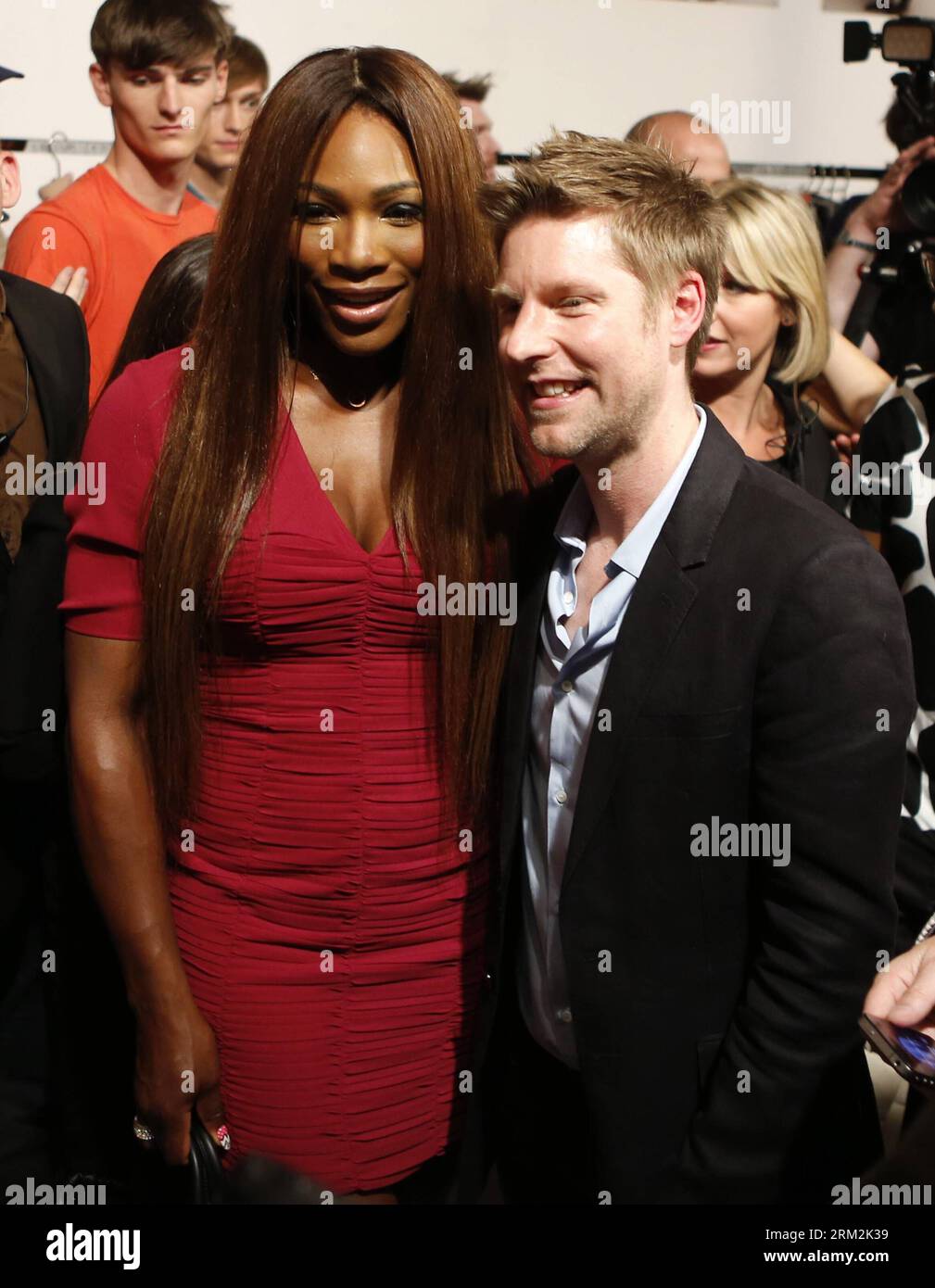 LONDON, June 18, 2013 - American professional tennis player Serena Williams (L) and Burberry Chief Creative Officer Christopher Bailey pose backstage at Burberry Menswear Spring/Summer 2014 at Kensington Gardens in London, Britain on June 18, 2013. (Xinhua/Wang Lili) BRITAIN-LONDON-FASHION-MENSWEAR-BURBERRY PRORSUM PUBLICATIONxNOTxINxCHN Stock Photo