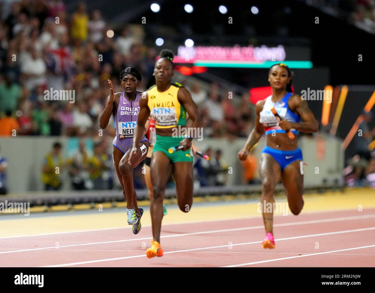 Great Britain's Daryll Neita (left) in action in the Women's 4x100