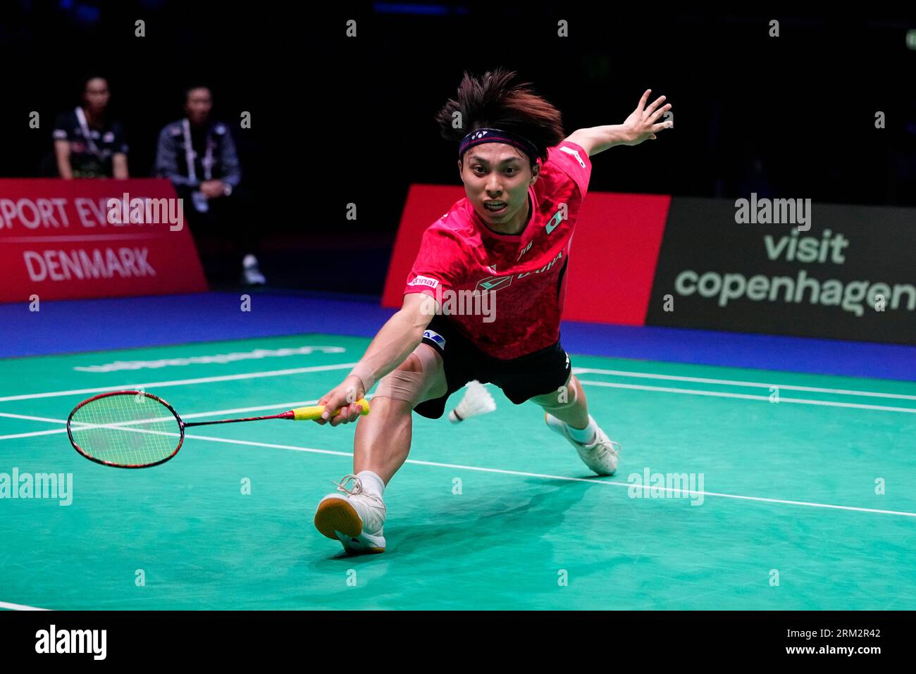 Kodai Naraoka of Japan plays against Anders Antonsen of Denmark during a semi-final mens single match at the Badminton World Federation World Championship in Royal Arena in Copenhagen, Denmark, on Saturday, Aug.