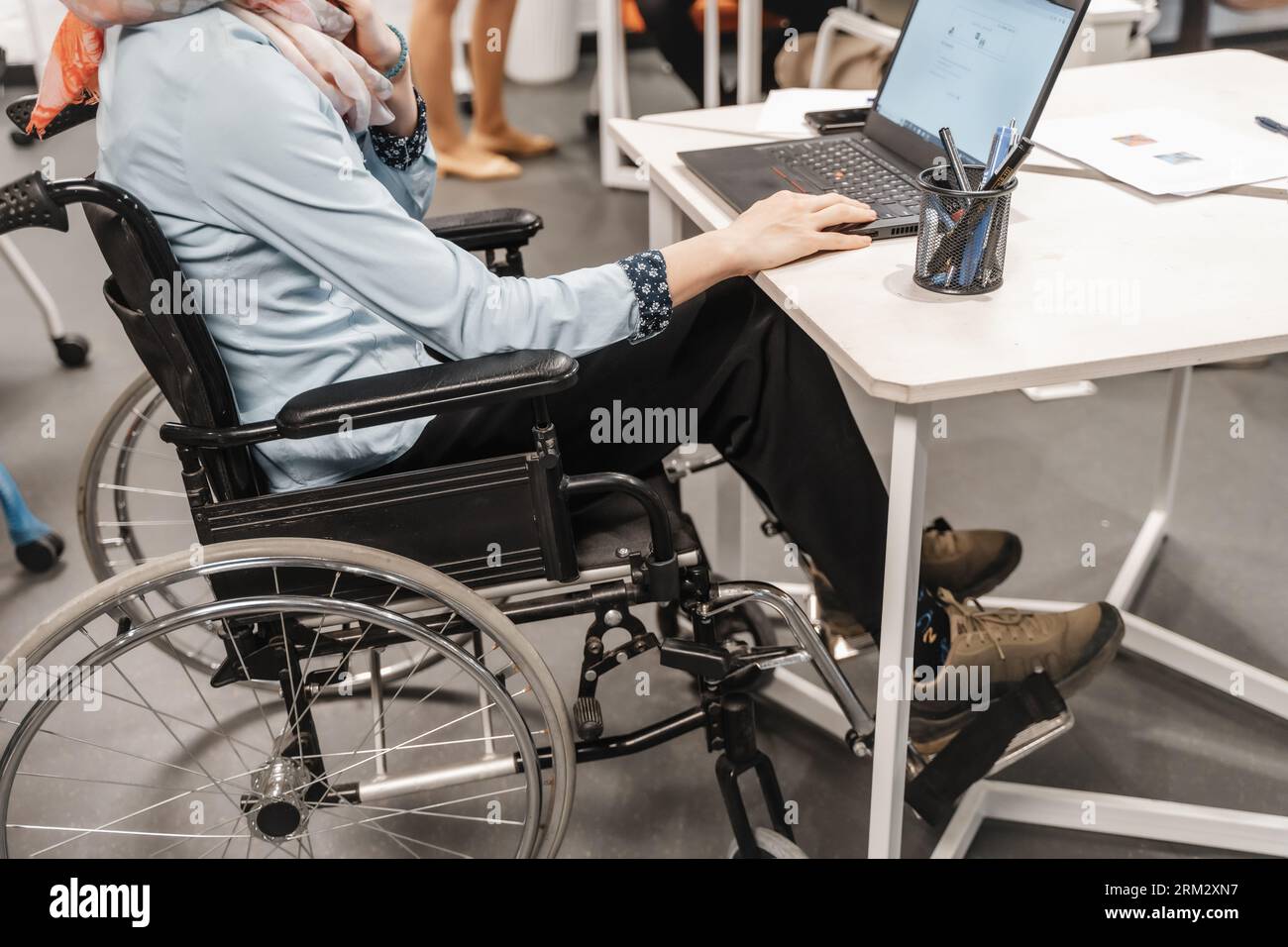 Paralyzed female employee hi-res stock photography and images - Alamy