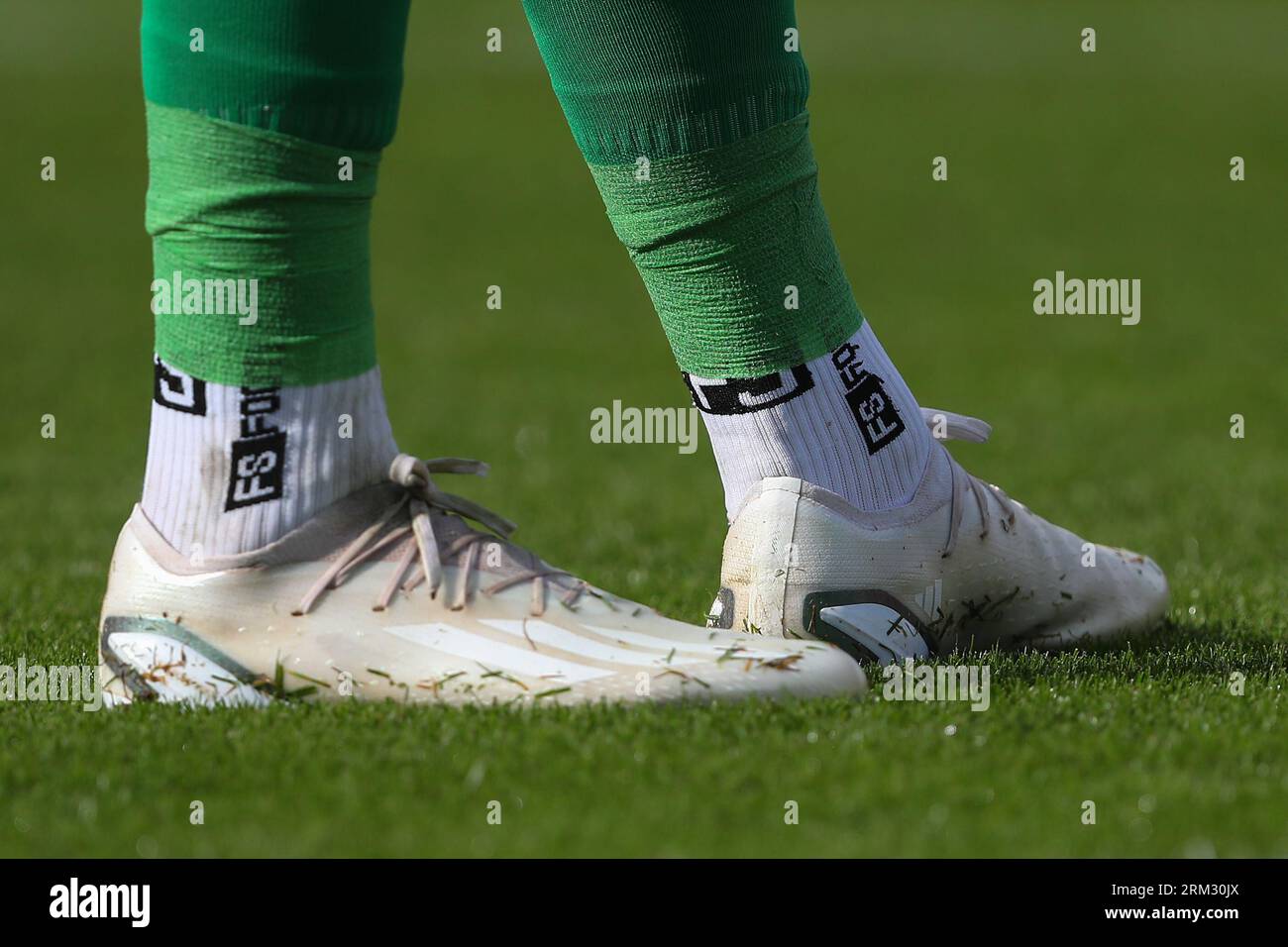 Lincoln, UK. 26th Aug, 2023. The Adidas boots of Lukas Jensen #1 Lincoln City during the Sky Bet League 1 match Lincoln City vs Blackpool at Gelder Group Sincil Bank Stadium, Lincoln, United Kingdom, 26th August 2023 (Photo by Gareth Evans/News Images) in Lincoln, United Kingdom on 8/26/2023. (Photo by Gareth Evans/News Images/Sipa USA) Credit: Sipa USA/Alamy Live News Stock Photo