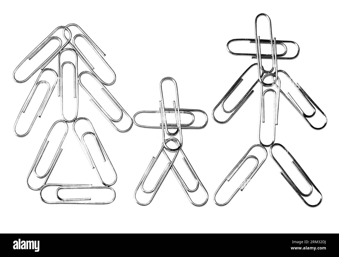 Paperclips arranged in the form of a family, isolated over white