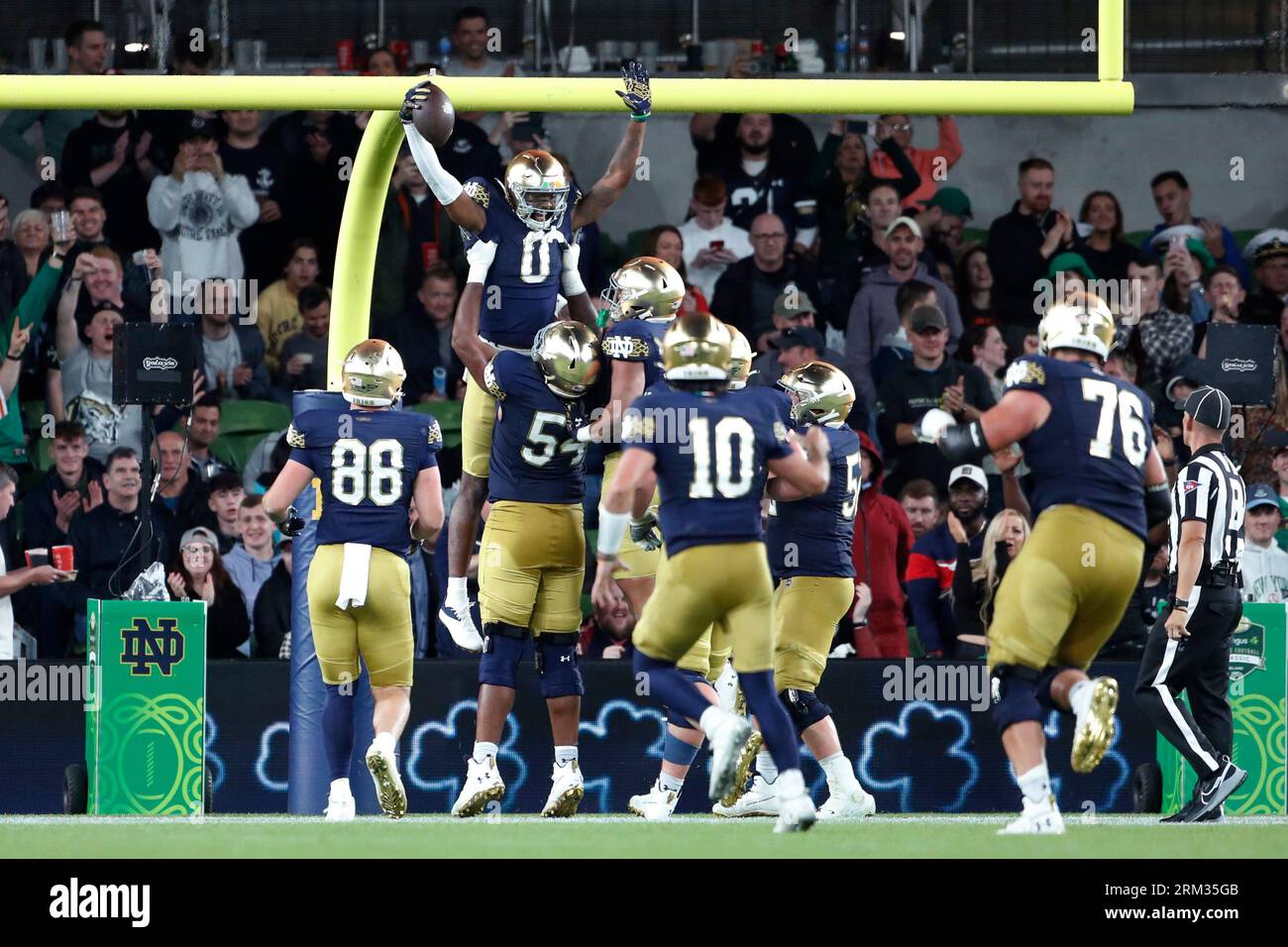 Notre Dame wide receiver Deion Colzie (0) celebrates with teammates