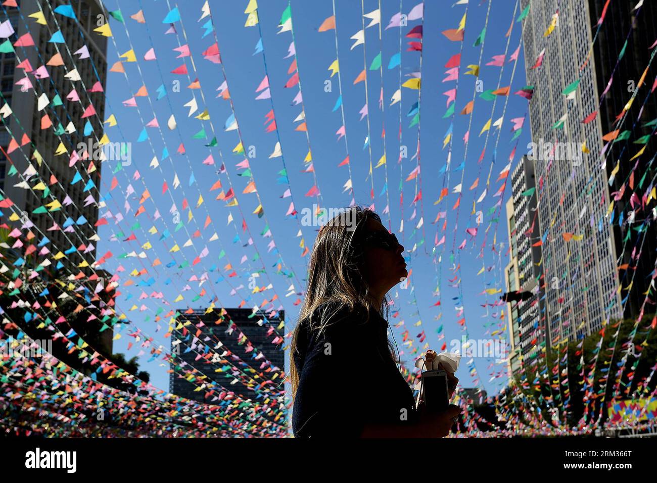 Bildnummer: 60050275  Datum: 07.07.2013  Copyright: imago/Xinhua A woman participates in the annual feast Festa Junina (June Festival), that is celebrated in the beginning of the Brazilian winter, in downtown Sao Paulo, Brazil, on July 7, 2013. The Junina Feast, which was introduced by the Portuguese during the colonial period, is celebrated during the month of June nationwide both in Brazil and Portugal with different religious festivities. (Xinhua/Rahel Patrasso) (rt) (sp) BRAZIL-SAO PAULO-SOCIETY-JUNE FESTIVAL PUBLICATIONxNOTxINxCHN Gesellschaft Fest Feier x0x xrj 2013 quer     60050275 Dat Stock Photo