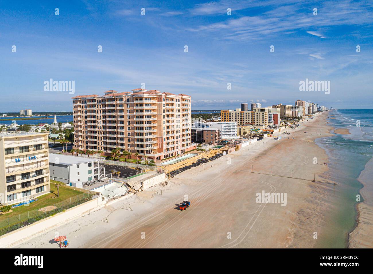 Daytona Beach Shores Florida,Atlantic Ocean,aerial overhead from above view,oceanfront condominium hotels,Hurricane Ian Nicole cleanup,swimming pool d Stock Photo