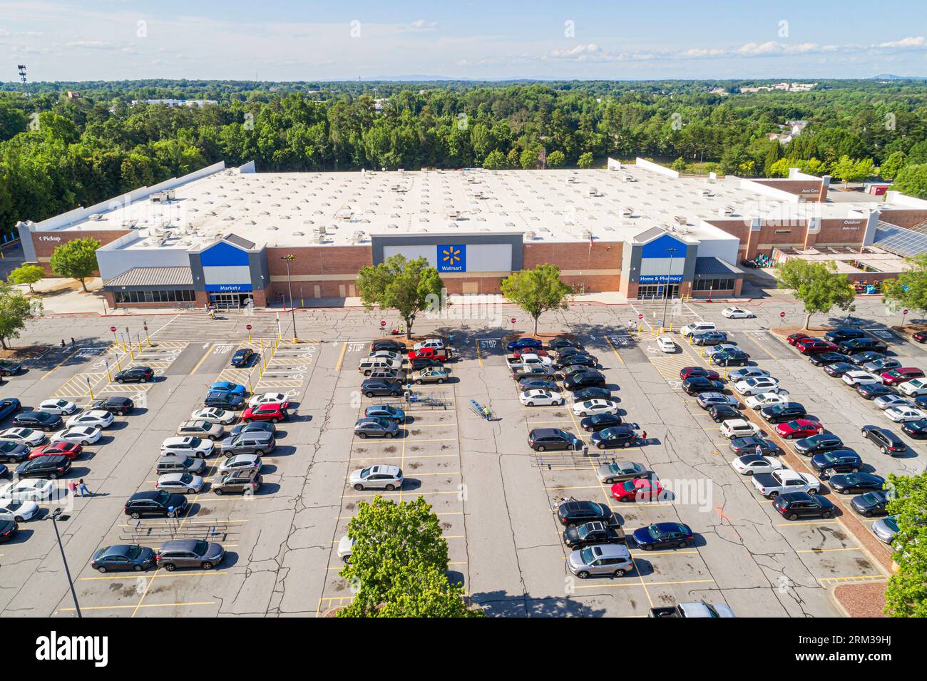 Roswell Atlanta Georgia,Walmart Supercenter,aerial overhead from above view,parking lot cars vehicles,outside exterior,building front entrance,store b Stock Photo