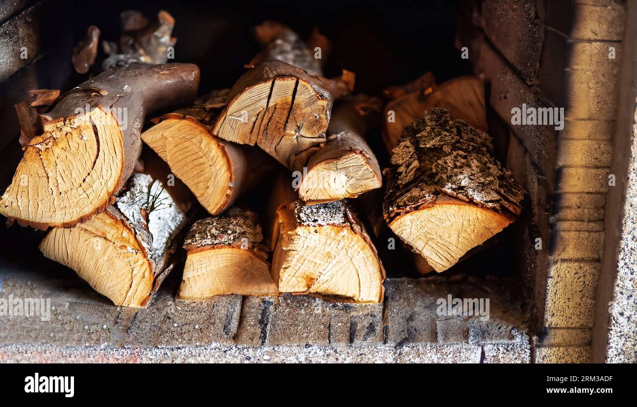 rown logs, firewood for home heating in winter, pine, oak logs, wood