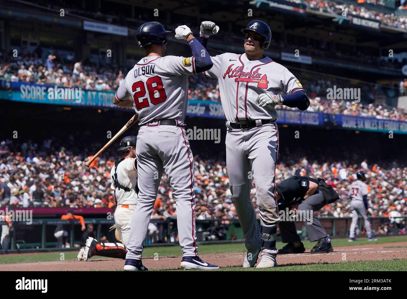 Austin Riley of the Atlanta Braves is congratulated by Matt Olson