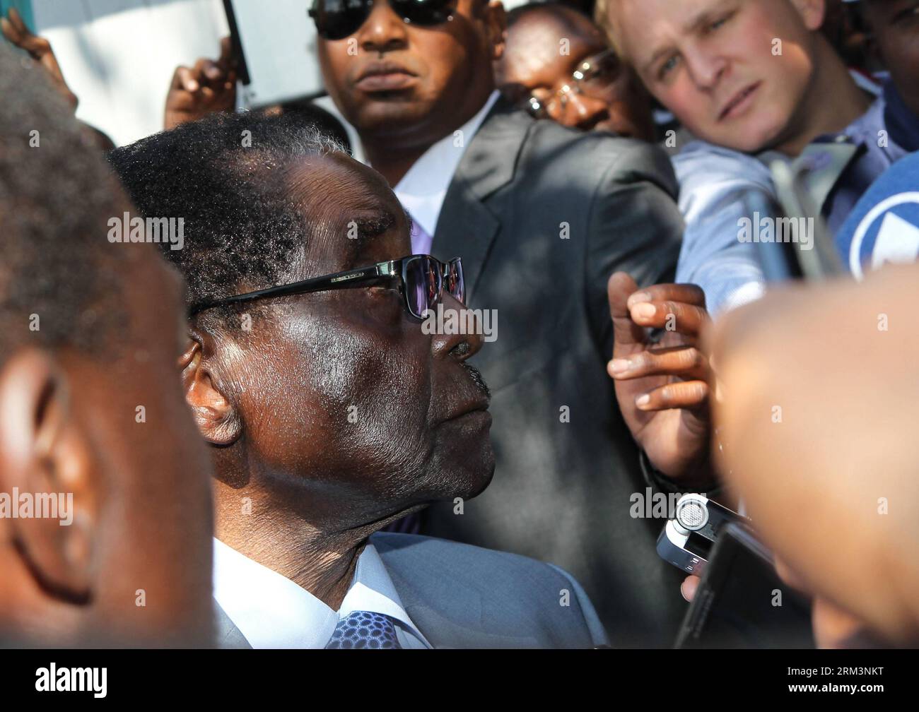 Bildnummer: 60263707  Datum: 31.07.2013  Copyright: imago/Xinhua HARARE, July 31, 2013 (Xinhua) -- Zimbabwe s incumbent President and presidential candidate of Zimbabwe African National Union-Patriotic Front (Zanu-PF) Robert Mugabe receives an interview after casting his ballot at a polling station in Harare, capital of Zimbabwe, July 31, 2013. Robert Mugabe, Africa s oldest leader at 89, said Wednesday that he will serve a full five-year term if re-elected into the office. A total of 6.4 million registered voters in Zimbabwe lined up to cast their ballots at 9,735 polling stations on Wednesda Stock Photo