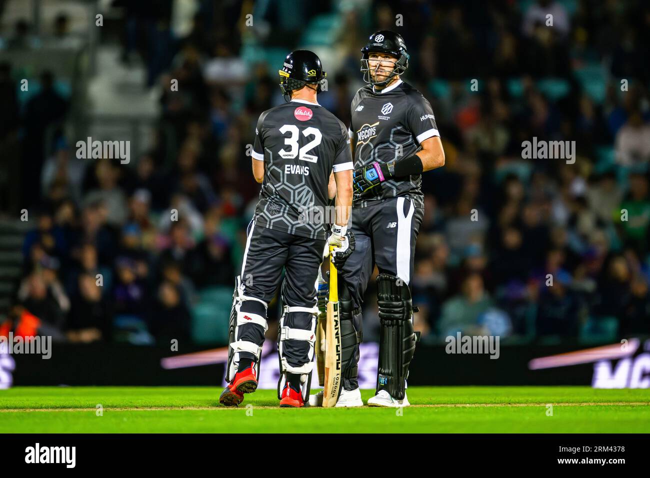 LONDON, UNITED KINGDOM. 26 August, 2023. Laurie Evans of Manchester Originals (Capt.) (left) and Jamie Overton of Manchester Originals (right) during The Eliminator - Manchester Originals vs Southern Brave at The Kia Oval Cricket Ground on Saturday, August 26, 2023 in LONDON ENGLAND.  Credit: Taka Wu/Alamy Live News Stock Photo